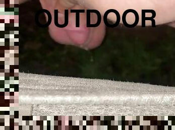 Shaved small cock crouch pissing outdoors