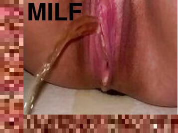 Milf peeing on floor