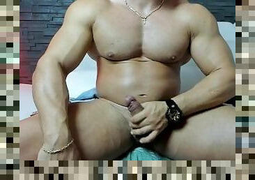 big muscled man jerk and shoot massive load