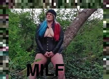 Milf in leather, mastrubates and cums on public forest trail
