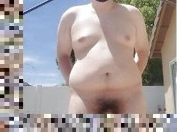 Small dick ugly bastard walks around naked in backyard