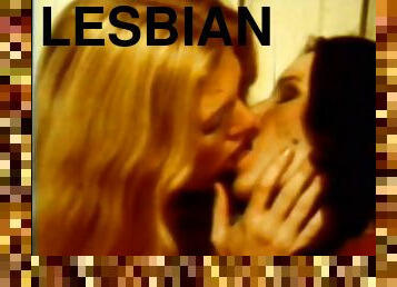 Lesbian Babes Eat Their Pussies Wearing Sexy Lingerie in a Retro Porn Scene