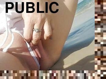 Crotchless microbikini on public beach letting the waves tickle my exposed pussyd