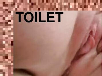 Masturbating on the toilet while parents in the other room