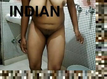 Indian Bhabhi Passing Urine In Bathroom