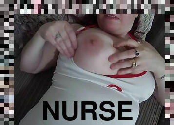 Nurse fucks herself with a dildo