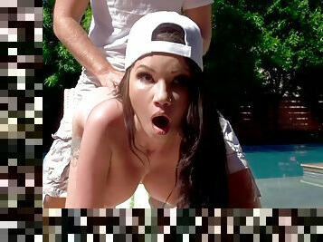 Big boobs girl in a baseball cap takes cock in the ass at pool side