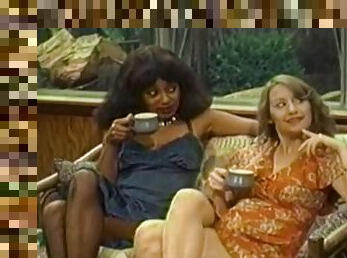 Retro porn video with interracial FFM threesome on the sofa