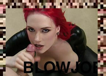 Red-haired chick in latex outfit gives a blowjob