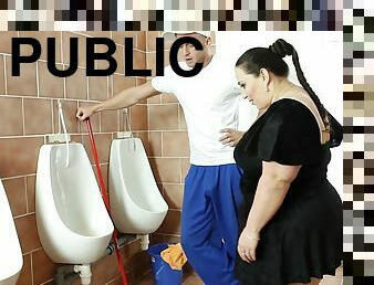 Brunette BBW enjoys while sucking a dick in a public bathroom