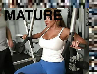 Horny and fit mature Ava Devine gets fucked hard in the gym