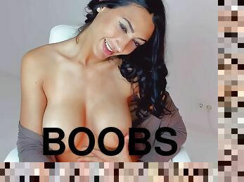 brunette cam slut with big fake tits toying herself on webcam