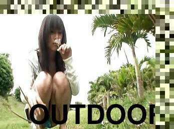 Outdoors video of cute Japanese girl Junko Hayama giving a BJ