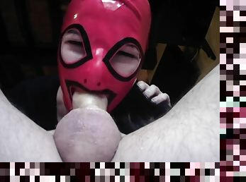Homemade POV video of a kinky girl with a mask sucking a large cock