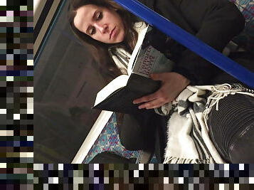 Girl read book in London metro