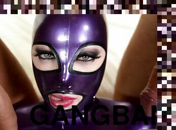 Latex slave babe gets gangbanged