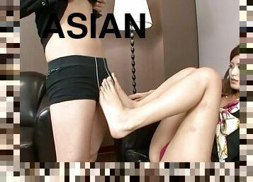 Asian lady boss Asada Yuki enjoys giving a footjob to her lover