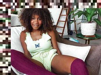 Ebony model Scarlit Scandal opens her legs to play with a vibrator