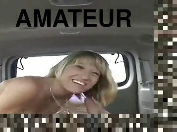 amateur MILF sucks cock in the car