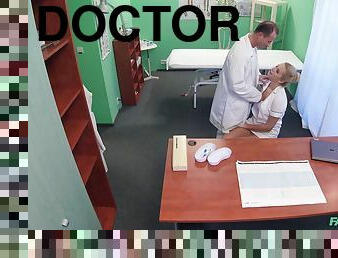 Doctor and his nurse are feeling a bit horny and decide to have sex