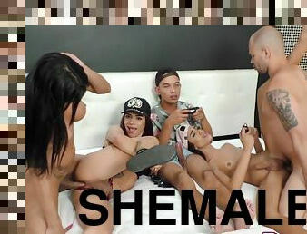 Video Game Party Turns Into a Sizzling Orgy with Three Big Dicked Shemales