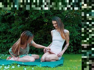 Skinny european lesbian girl fucks with girlfriend in park