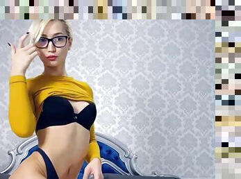 Beautiful blonde in glasses loves to finger her pussy and ass on her webcam.