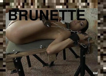 Brunette Miky Love strapped on the table and abused with fuck machine