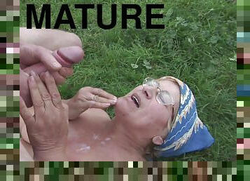 Mature country granny takes cum on her face outdoors