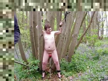 Outdoors bondage, spanking and training in nature.