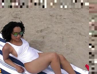 Ebony babe Pixie Minx blows and swallows cum at the beach