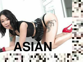 Tattooed Asian pornstar Saya Song pussy licked in miniskirt