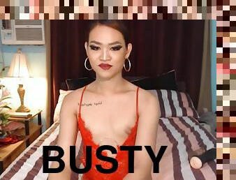 Busty shemale wants to hold her cock and played it infront of the camera.