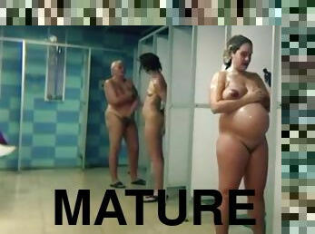 Beautiful pregnant and mature women unware of the hidden camera.