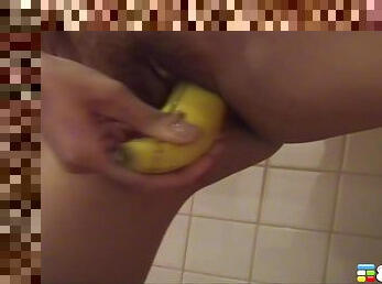 Far Sarawimol uses a banana to pleasure her juicy cunt