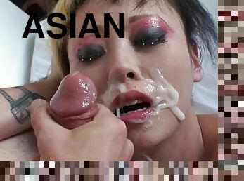 Tattooed Asian slut gets a ridiculously huge facial