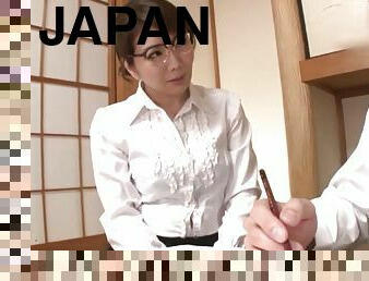 Nerdy Japanese brunette MILF Ono Sachiko gives a tit job