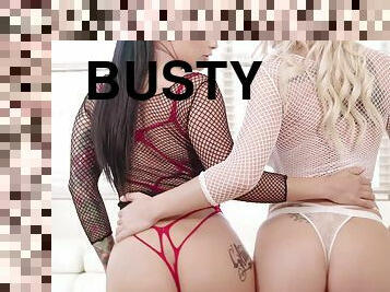 Two gorgeous busty porn star babes fuck one cock in fishnet stockings