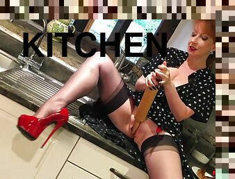 Red XXX fucks the rolling pin in the kitchen