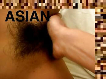 Asian chick Shizu Umemiya makes a cock disappear in her hairy pussy