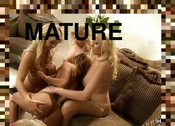 Demi Delia joins a bunch of mature chicks for a lesbian orgy