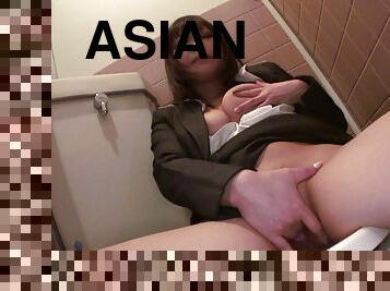 Lovely Asian secretary fingers her tight cunt in the bathroom