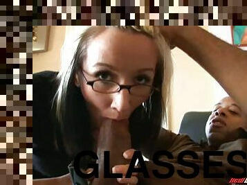 Honey in glasses reaches orgasm as she rides on a massive black dong