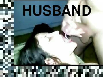 Husband sharing his brunette wife