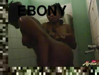 Hot ebony chicks are kissing lustfully in the bathroom