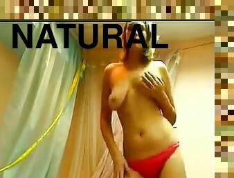 Cute blonde webcam girls puts on a nice striptease show