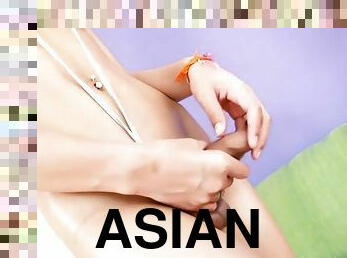 Asian ladyboy shows ass and masturbates her hard cock