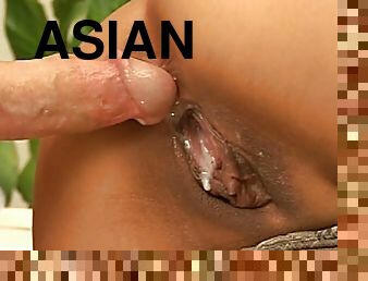 Big white dick inseminates the sexy Asian girl in a creampie video