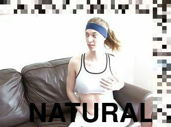 Sporty babe with big natural tits relaxes masturbating on the couch