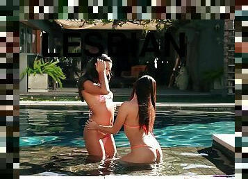 Jenna sativa and Maya Grand have a lesbian experience in the pool